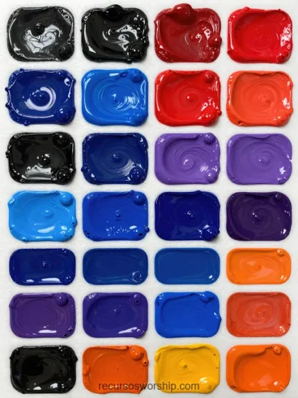 Mosaico paletas pintura artistica pigmento denso negro azul real profundo rojo carmin morado lila naranja compartimentos rectangulares huellas espatula oleo espeso vertical cenital artista textura