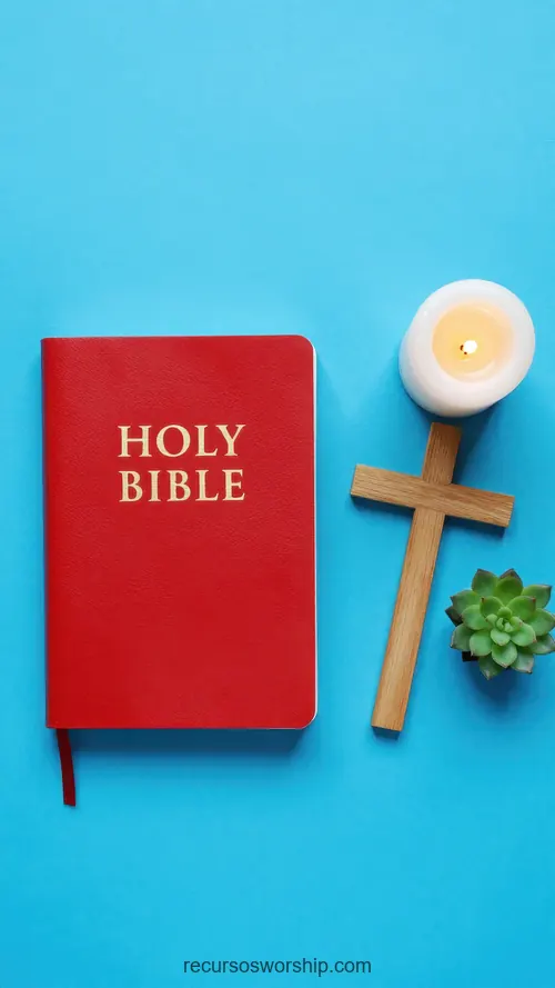 Holy Bible Roja con Cruz Vela y Suculenta Fondo Azul Holy Bible roja con letras doradas junto a cruz de madera vela blanca encendida y suculenta verde sobre fondo azul celeste brillante cenital vertical